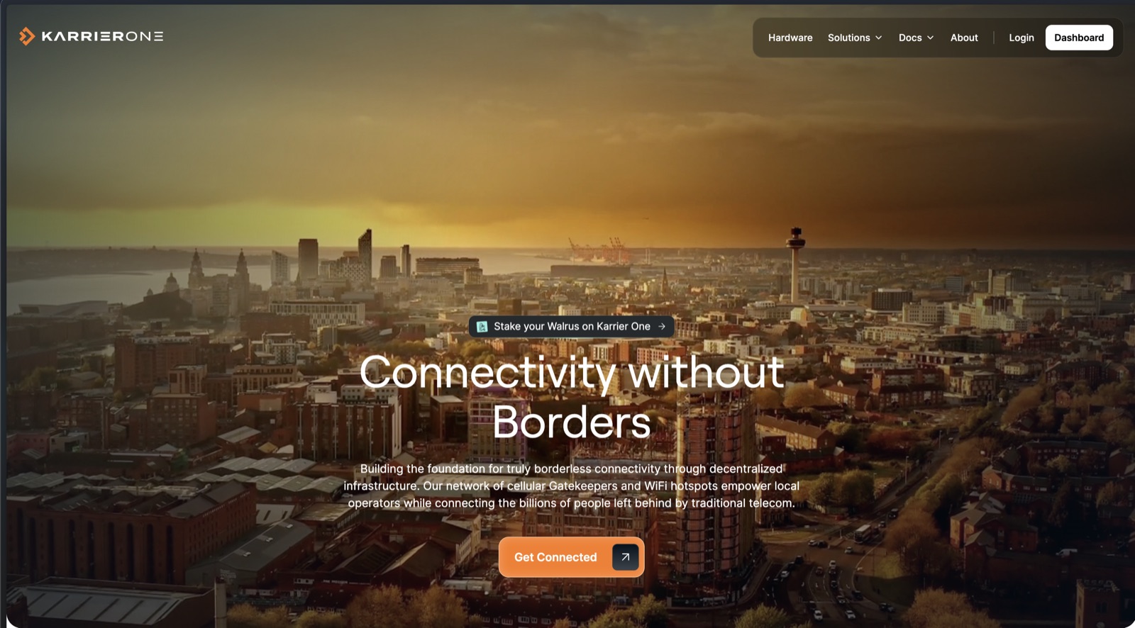 Karrier One landing-page hero with the Connectivity without Borders headline, city backdrop, and primary call to action.
